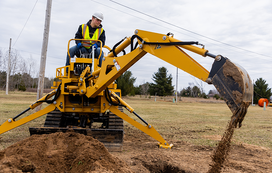 Worker operating a machine