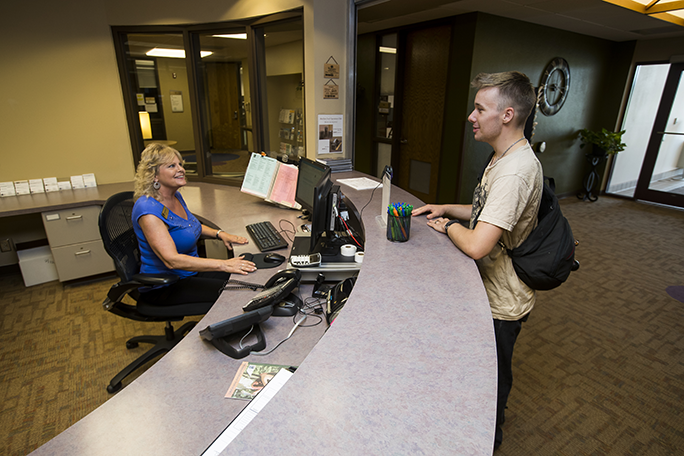 A student being greeted by WITC support staff