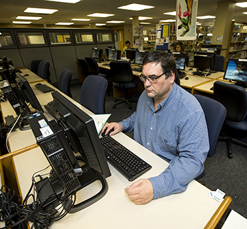 Students working at computers in the Learning Resource Center. 