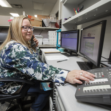 Student working and using the phone system