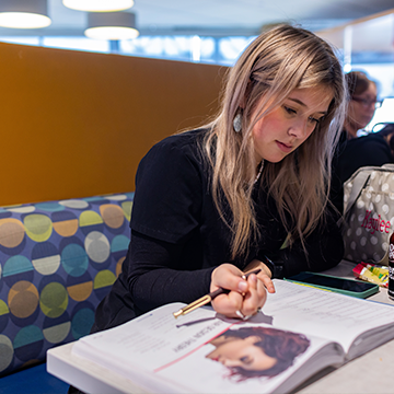 Student studying on campus