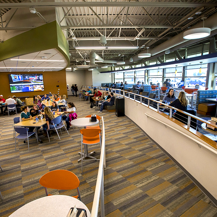 Image of WITC-Rice Lake's "The Hub" with students sitting at tables