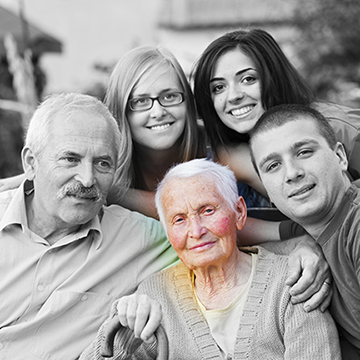A family surrounding an aging adult