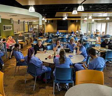 Ashland commons area with students sitting around