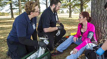Advanced EMT students practicing a real life scenario