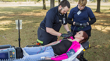 EMT-Paramedic students practicing skills